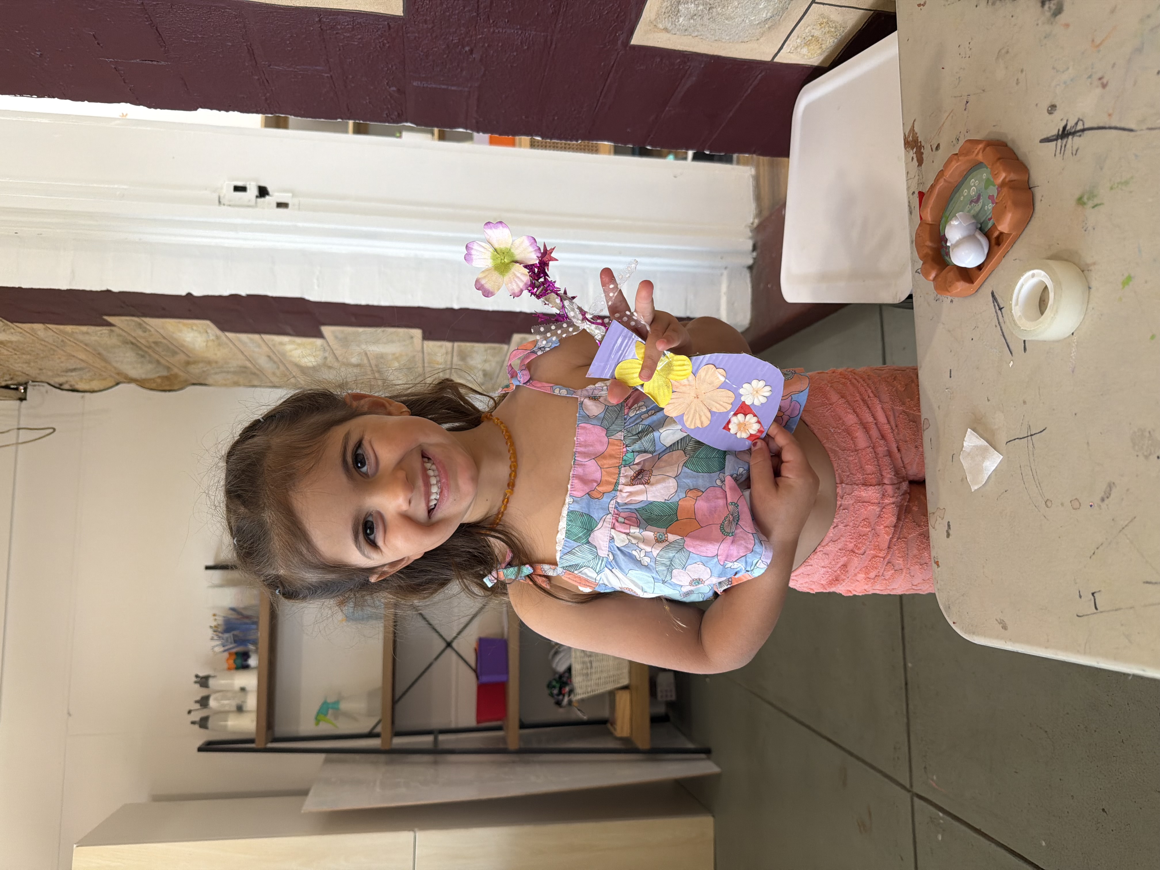 Child and educator creating art at Mini Ivy studio Adelaide