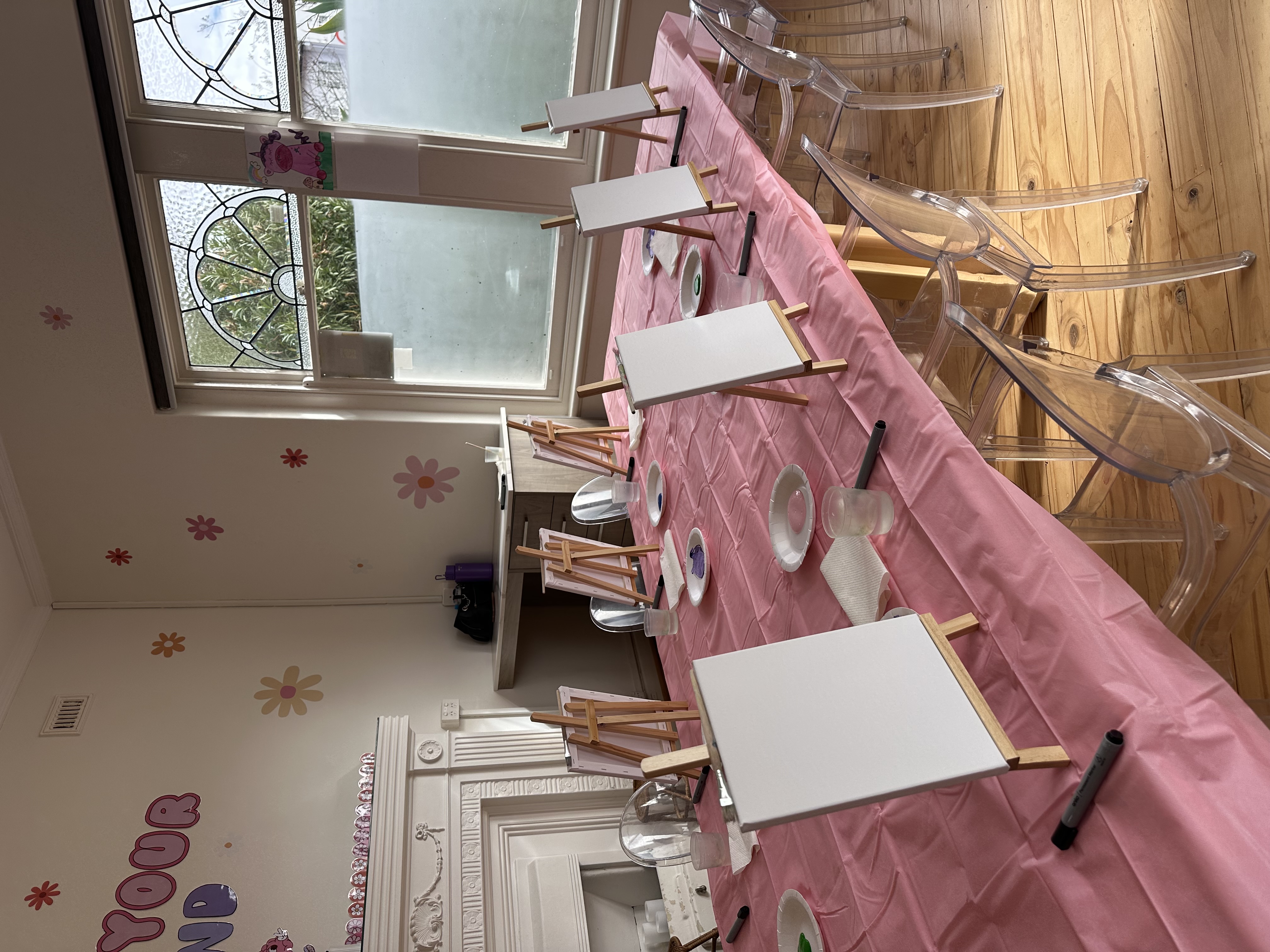 Mini Ivy party studio set up with paints and canvases